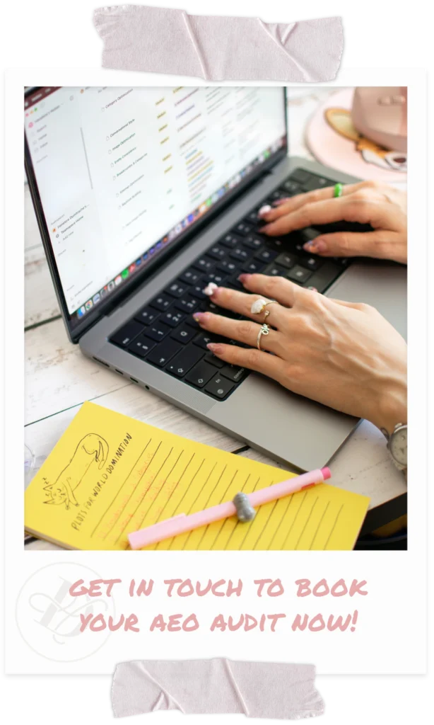 hands typing on laptop with yellow notepad next to laptop